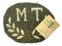 WW2 Canadian Army MT Motor Transport Trade Badge Patch with Taylors Tag WW2 Canadian Army MT Motor Transport Trade Badge Patch with Taylors Tag