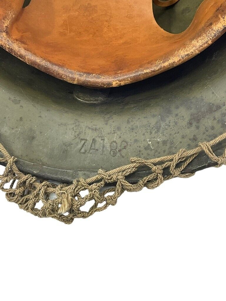 WW2 US Army Kelly Helmet with Original Scrim Net Liner and Chin Strap WW2 US Army Kelly Helmet with Original Scrim Net Liner and Chin Strap