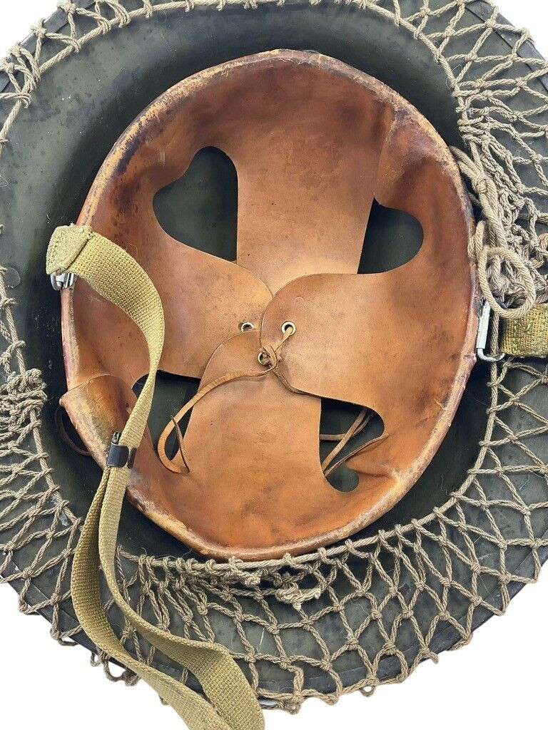 WW2 US Army Kelly Helmet with Original Scrim Net Liner and Chin Strap WW2 US Army Kelly Helmet with Original Scrim Net Liner and Chin Strap