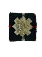 WW2 British Highland Light Infantry Cap Badge with Tartan Backing