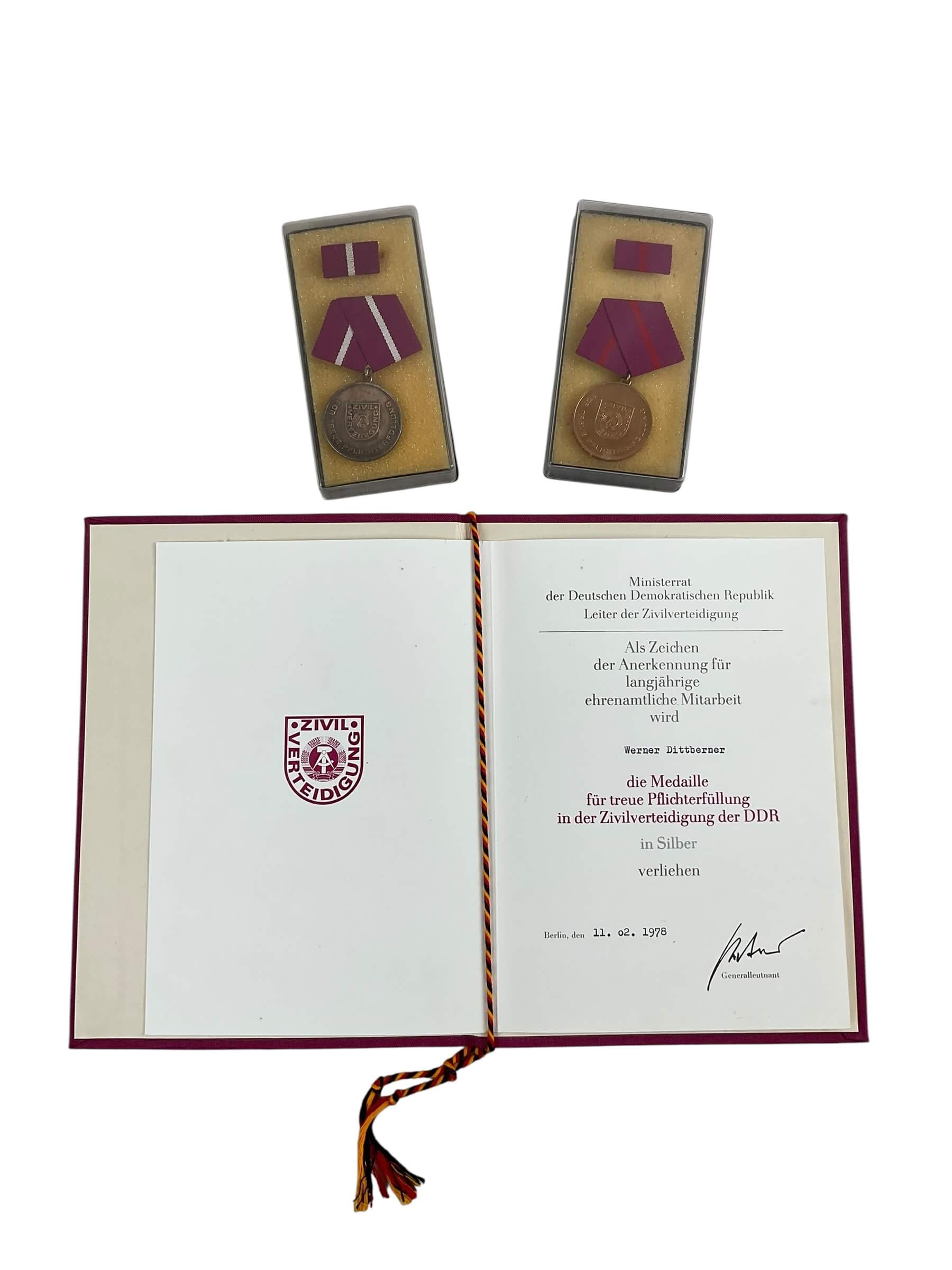 East German DDR Faithful Service X 2 Full Size Medals With Ribbon Bars and Document East German DDR Faithful Service X 2 Full Size Medals With Ribbon Bars and Document