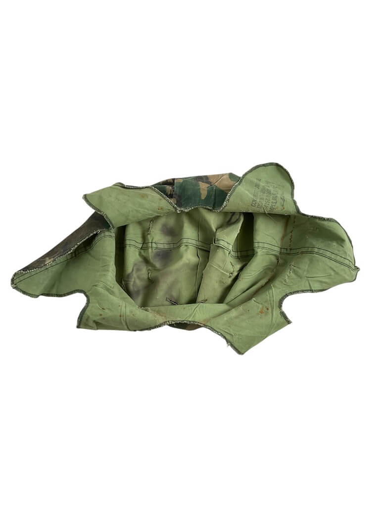 US Army M1 Camouflage Helmet Cover Dated 1977 US Army M1 Camouflage Helmet Cover Dated 1977