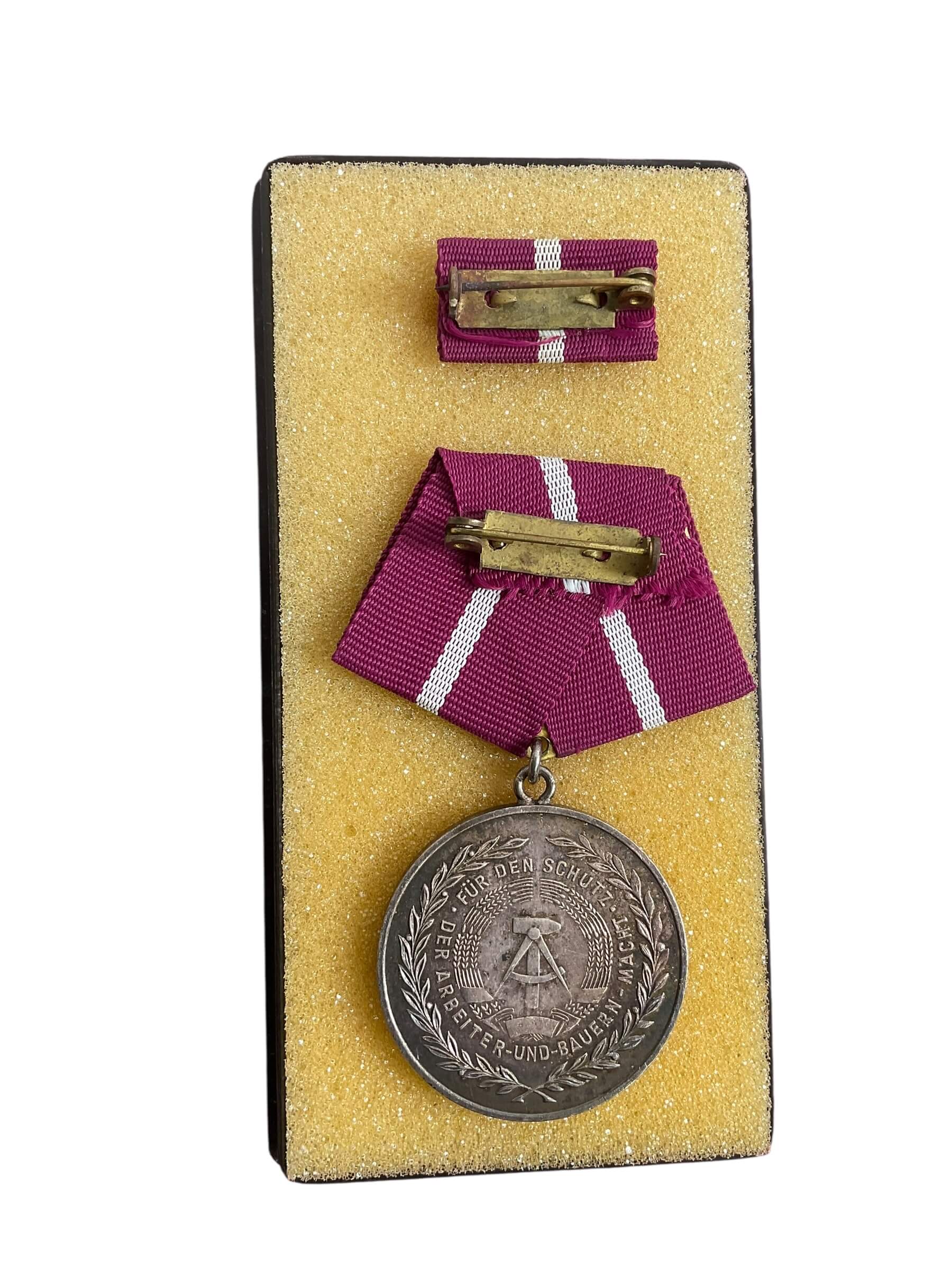 East German DDR Faithful Service X 2 Full Size Medals With Ribbon Bars and Document East German DDR Faithful Service X 2 Full Size Medals With Ribbon Bars and Document