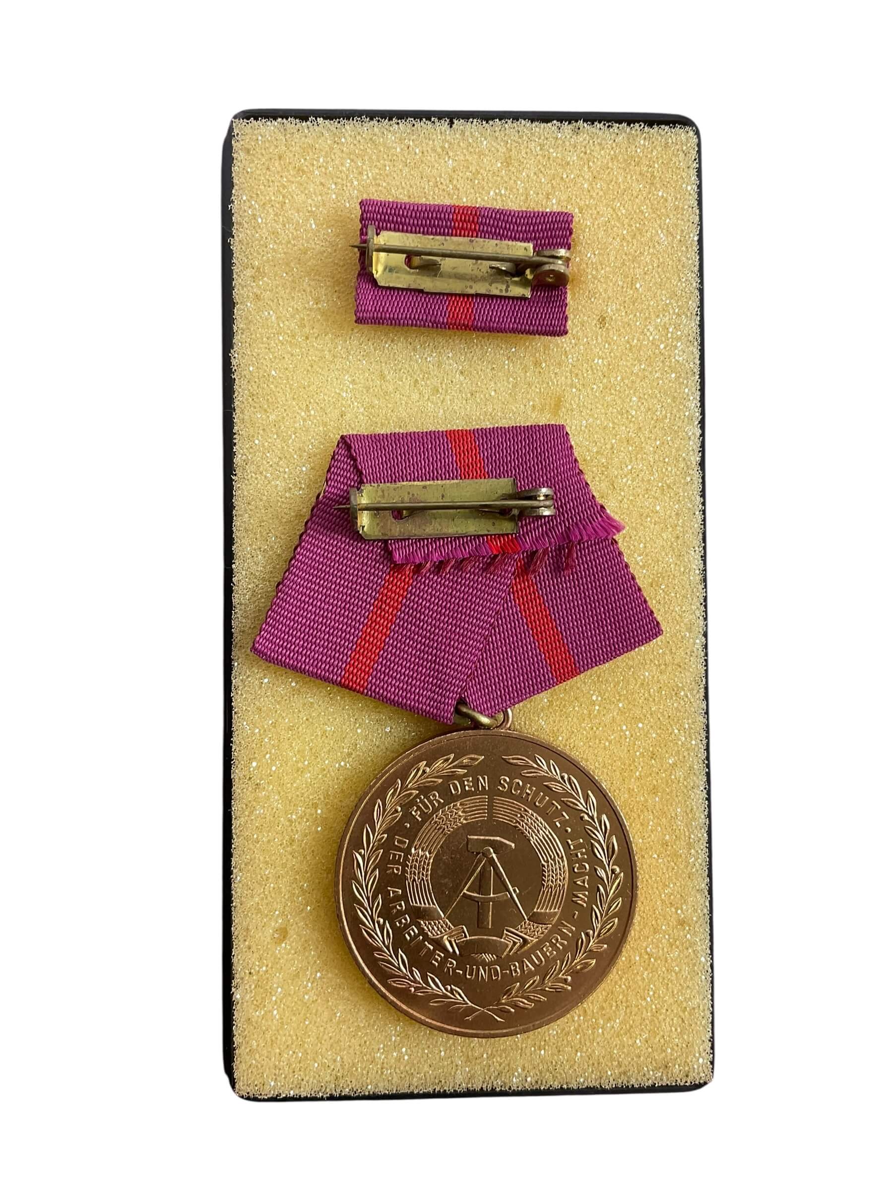 East German DDR Faithful Service X 2 Full Size Medals With Ribbon Bars and Document East German DDR Faithful Service X 2 Full Size Medals With Ribbon Bars and Document