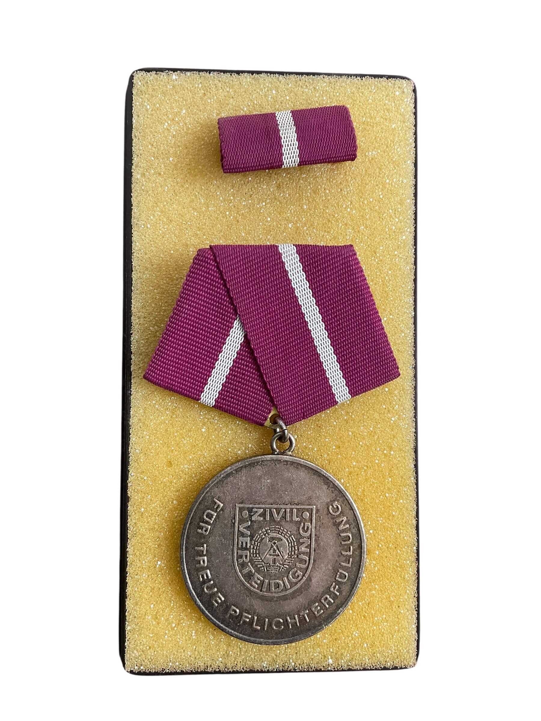 East German DDR Faithful Service X 2 Full Size Medals With Ribbon Bars and Document East German DDR Faithful Service X 2 Full Size Medals With Ribbon Bars and Document