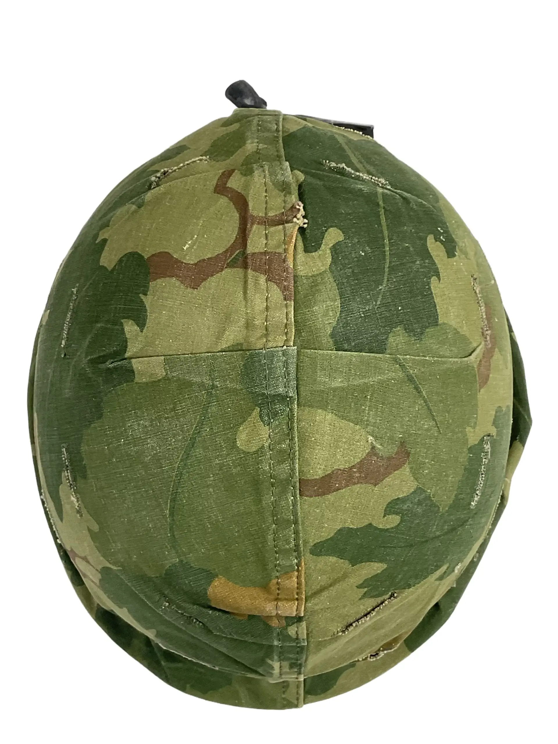 US Army M1 Rear Seam Swivel Bail Steel Helmet With Reversible Camouflage Cover 1964 and 1973 US Army M1 Rear Seam Swivel Bail Steel Helmet With Reversible Camouflage Cover 1964 and 1973
