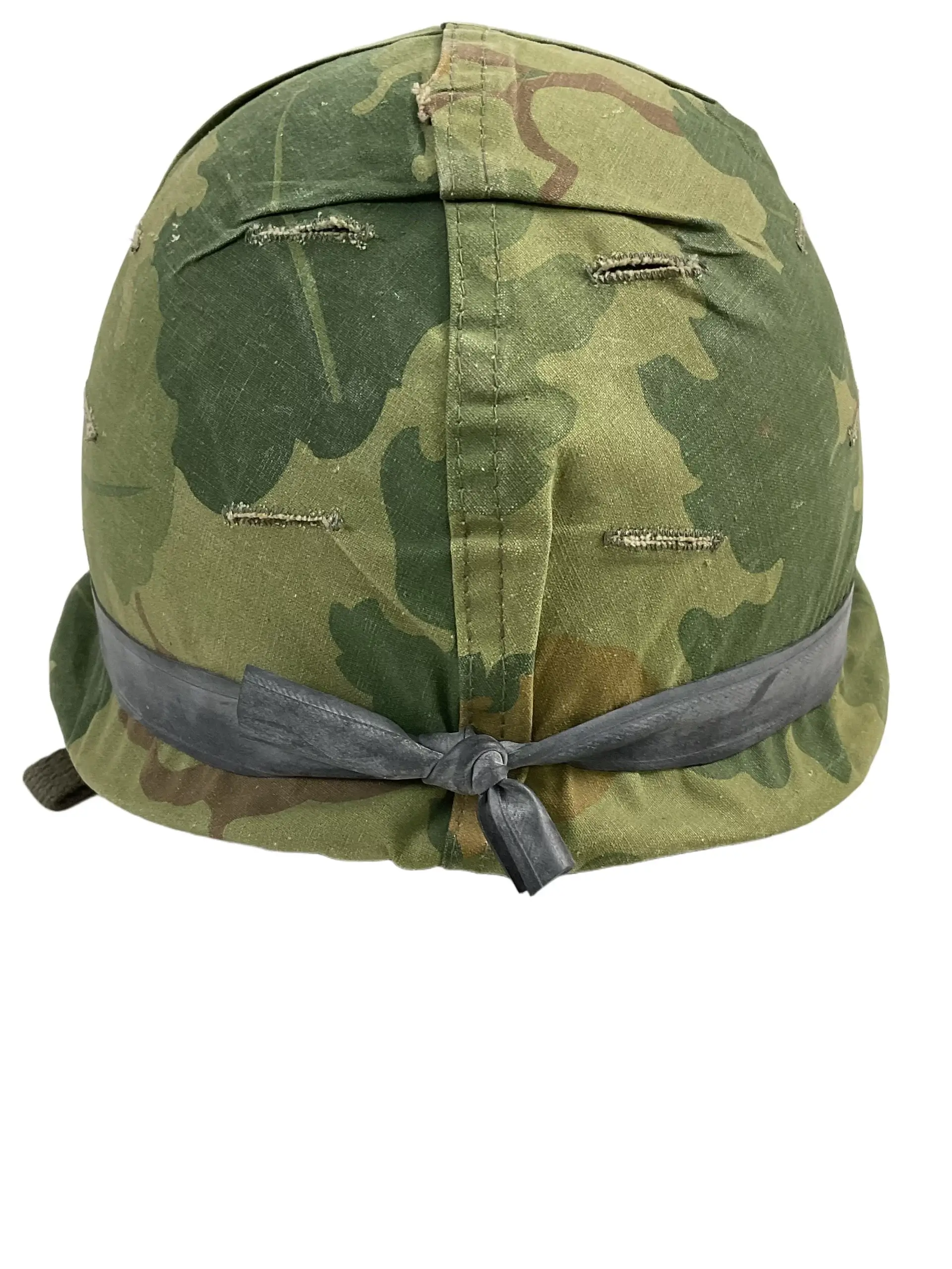 US Army M1 Rear Seam Swivel Bail Steel Helmet With Reversible Camouflage Cover 1964 and 1973 US Army M1 Rear Seam Swivel Bail Steel Helmet With Reversible Camouflage Cover 1964 and 1973