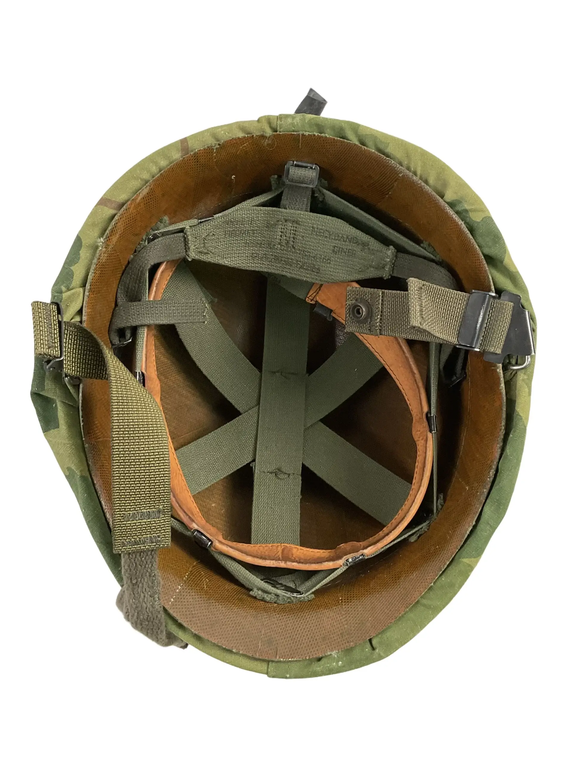 US Army M1 Rear Seam Swivel Bail Steel Helmet With Reversible Camouflage Cover 1964 and 1973 US Army M1 Rear Seam Swivel Bail Steel Helmet With Reversible Camouflage Cover 1964 and 1973