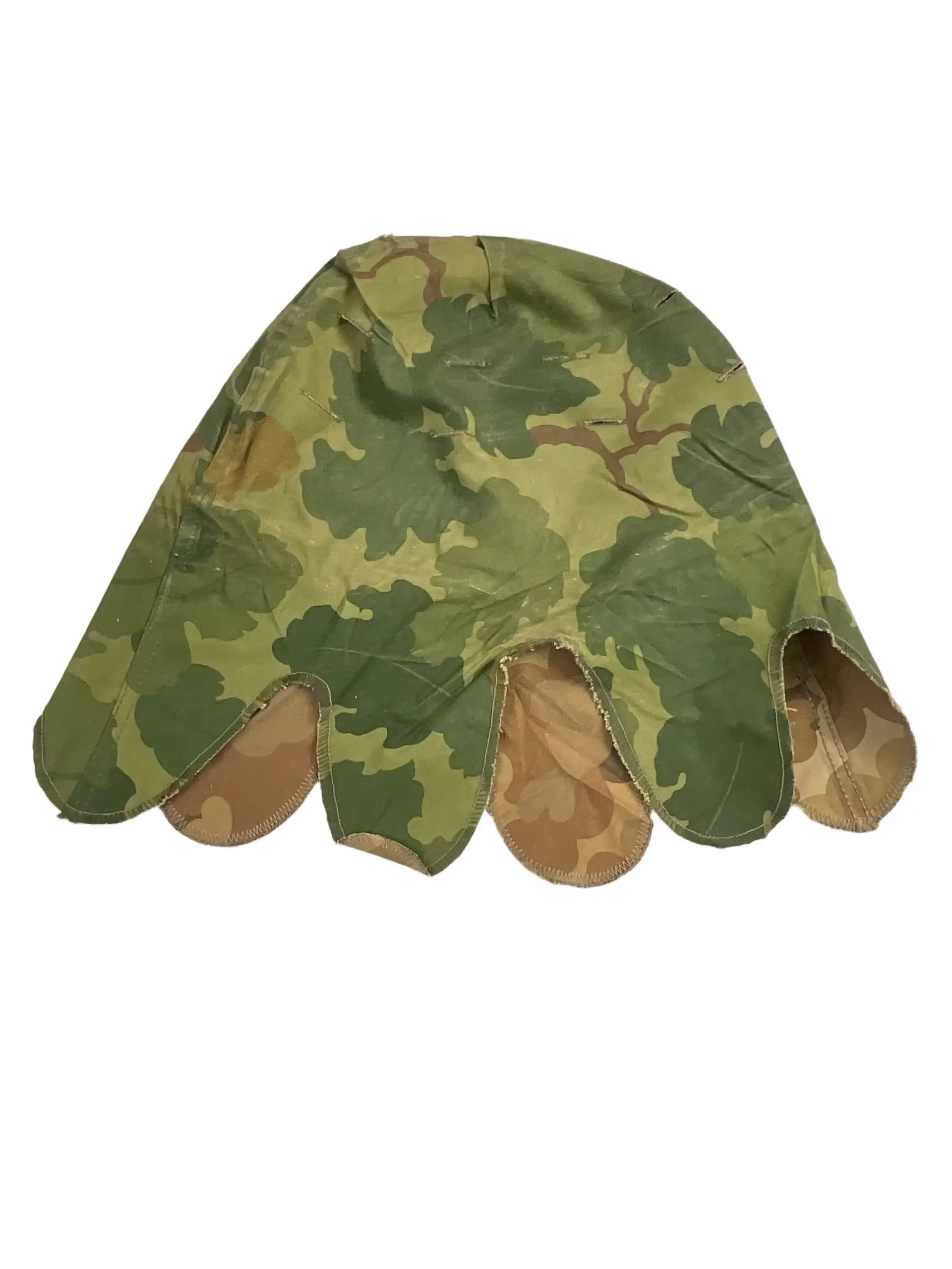 US Army M1 Rear Seam Swivel Bail Steel Helmet With Reversible Camouflage Cover 1964 and 1973 US Army M1 Rear Seam Swivel Bail Steel Helmet With Reversible Camouflage Cover 1964 and 1973