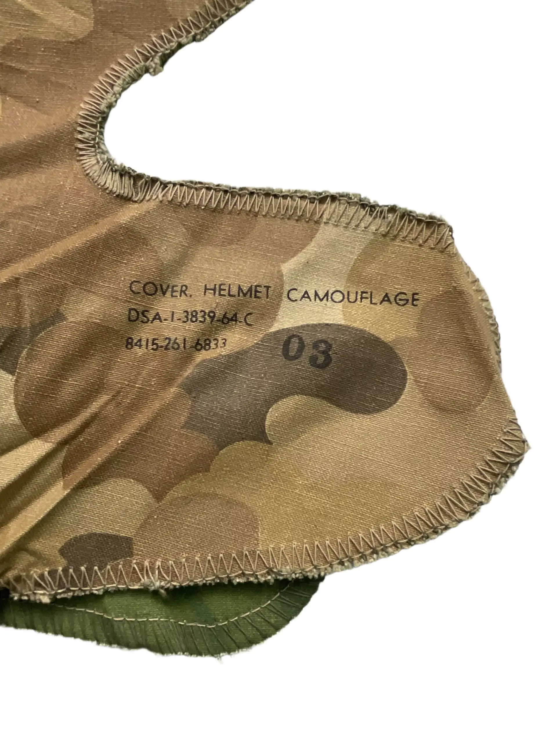 US Army M1 Rear Seam Swivel Bail Steel Helmet With Reversible Camouflage Cover 1964 and 1973 US Army M1 Rear Seam Swivel Bail Steel Helmet With Reversible Camouflage Cover 1964 and 1973